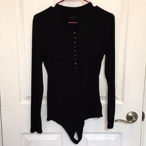 Long sleeve black body suit with silver buttons